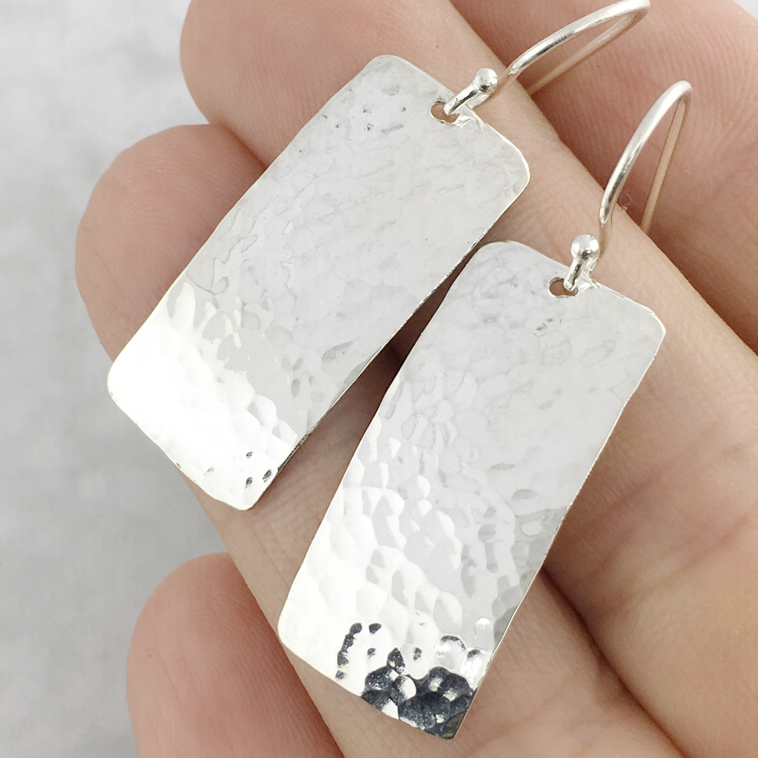 Sterling silver hand formed rectangular shaped post top and dangle earrings.